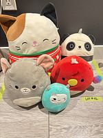 Front view of all five Squishmallows