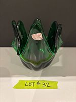 Oblique view of green six-petal handkerchief bowl