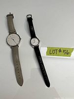 Front view of both wristwatches showing dials and straps