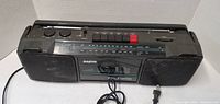 Front view of Sanyo dual cassette boombox with speakers and controls