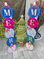 Front view showing both wood ornament signs and glitter tree
