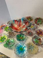 Group of individually wrapped epoxy resin bowls, various sizes and colours