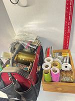 Overall view of Husky tote and wooden tray with spools