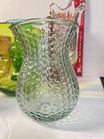 Clear hobnail bulb vase front view with texture visible