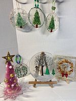 Full lot overview showing ornaments, plaques, bottlebrush tree