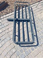 Full view of cargo carrier platform showing size and rails