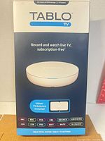 Front of Tablo TV retail box showing device image and key features