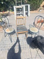 Group shot of three chairs outdoors