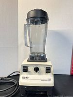 Full view of Vita-Mix 5000 blender with jar, lid and power cord