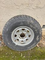 Full view of tire mounted on steel rim