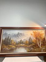 Full view of framed landscape painting