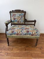 Front view of embroidered parlour settee chair