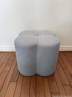 Front view showing clover shape and upholstery