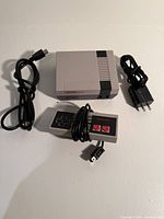 Console, controller, micro-USB cable and AC adapter displayed