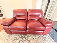 Front view showing full two-seat sofa, leather condition
