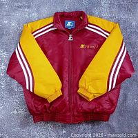 Full view of maroon and yellow Starter Woog 2 bomber jacket laid flat