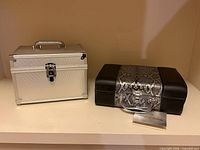 Both closed cases side by side