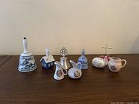 Group shot of all bells, pitchers and egg