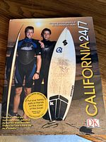 Front cover showing title, authors, surfboard image and DK logo