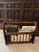 Front view of rack showing books and sheet music inside