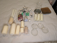 All items overview: tealights, tapers, pillar candles, glass dishes, hurricane glass, silver plate, copper tray