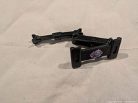 overall view of folded black headrest mount