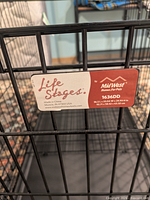Manufacturer label on crate showing MidWest Life Stages model 1636DD and dimensions