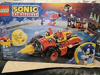 Front of sealed LEGO 76999 box showing set name, piece count and artwork