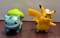Front view of Bulbasaur and Pikachu figures