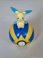 Front view of assembled Minun on Quick Ball