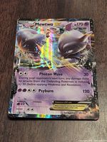 Front of Mewtwo EX card showing artwork, set details and holo pattern