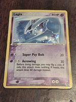 Front of Lugia POP Series 5 holo card showing artwork and holo pattern