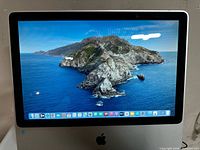 Front view of iMac powered on displaying macOS Big Sur desktop