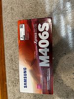 Front of sealed Samsung M406S toner cartridge box