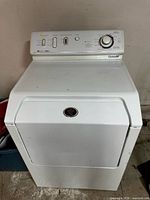 Front view of Maytag dryer showing control panel and closed door
