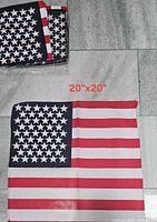 Stack of three folded American flag design bandanas and one opened showing full pattern with printed size 20"x20"