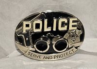 Front view of belt buckle showing full design
