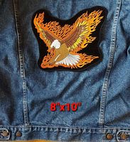 Front view of embroidered eagle patch on denim jacket, 8"x10" size reference