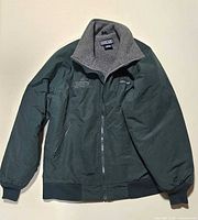 Front view showing full jacket, collar, embroidery, pockets and overall condition