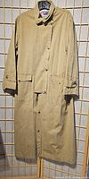 Front view of Koolah khaki long coat hanging