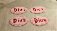 Four pink oval patches with "Diva" text