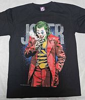 Full view of front showing Joker graphic, color, size Large tag visible