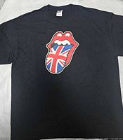 Full view of black T-shirt with Rolling Stones Union Jack tongue graphic