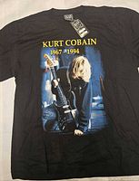 Front view showing Kurt Cobain graphic and size