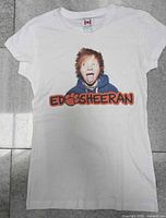 Front view of white Ed Sheeran women’s T-shirt showing graphic and label