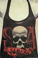 Front view showing skull, SA letters, Samcro banner