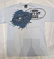Full front view of Vans light blue T-shirt showing graphic and overall condition
