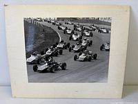 Front view of matted photograph showing race scene and mat condition