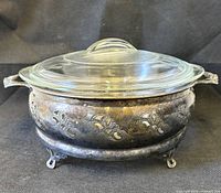 Glasbake casserole in silver plate holder, front view