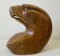 Left profile of brown soapstone eagle head sculpture